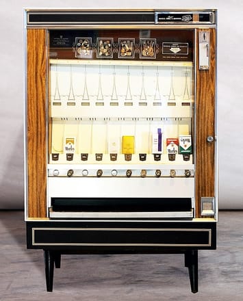 Illustrative example of antique cigarette vending machine