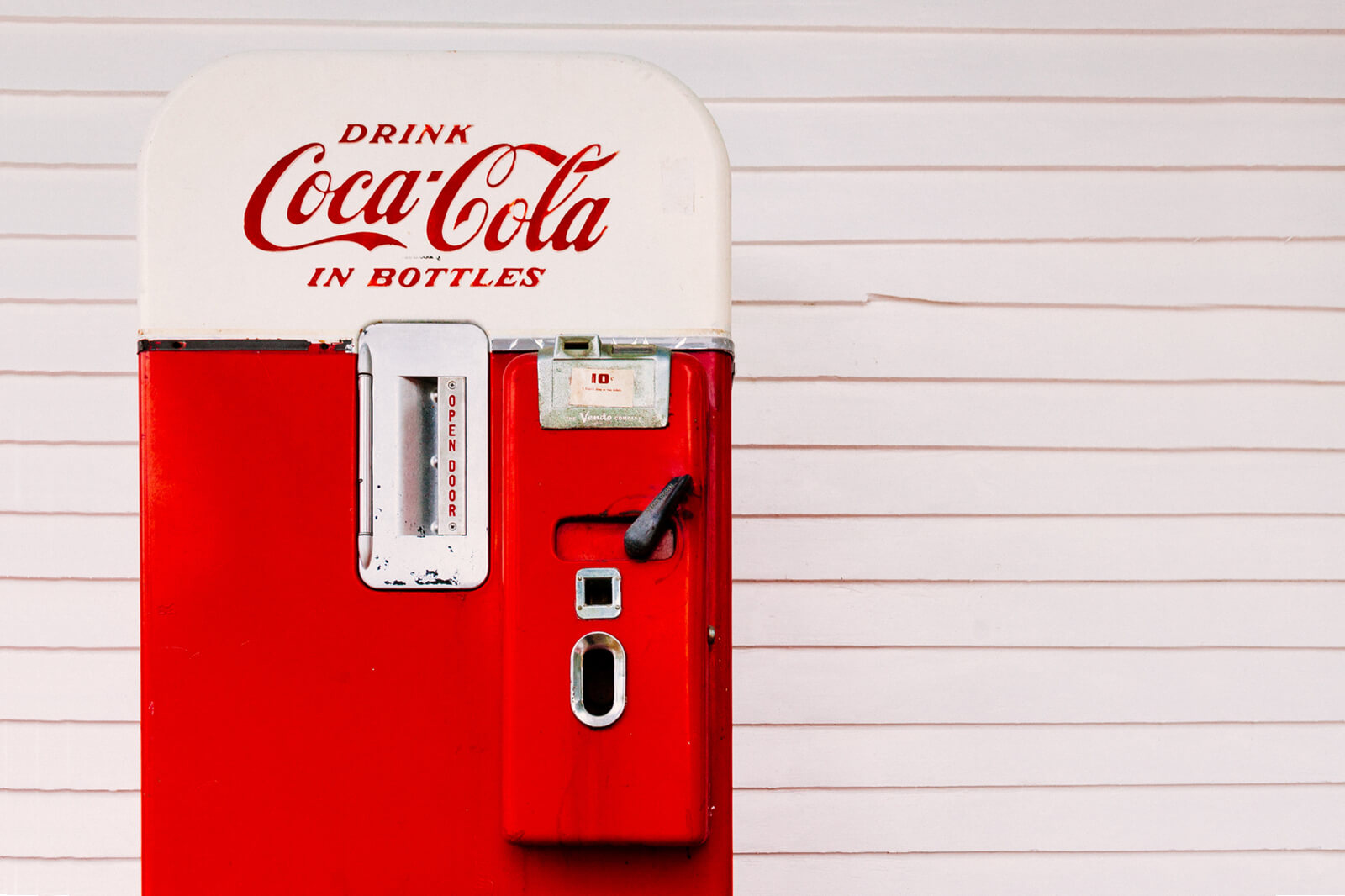 Illustrative example of antique coke vending machine