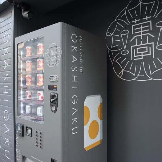 Illustrative example of cake in a can vending machine