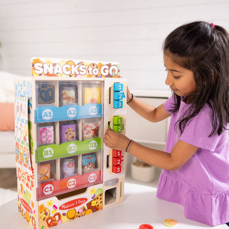 Illustrative example of melissa and doug toy vending machine