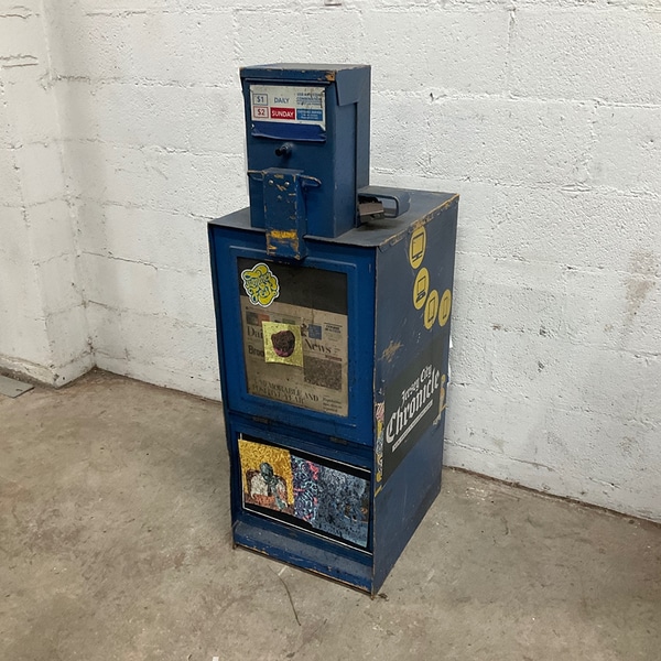 Illustrative example of newspaper vending machine