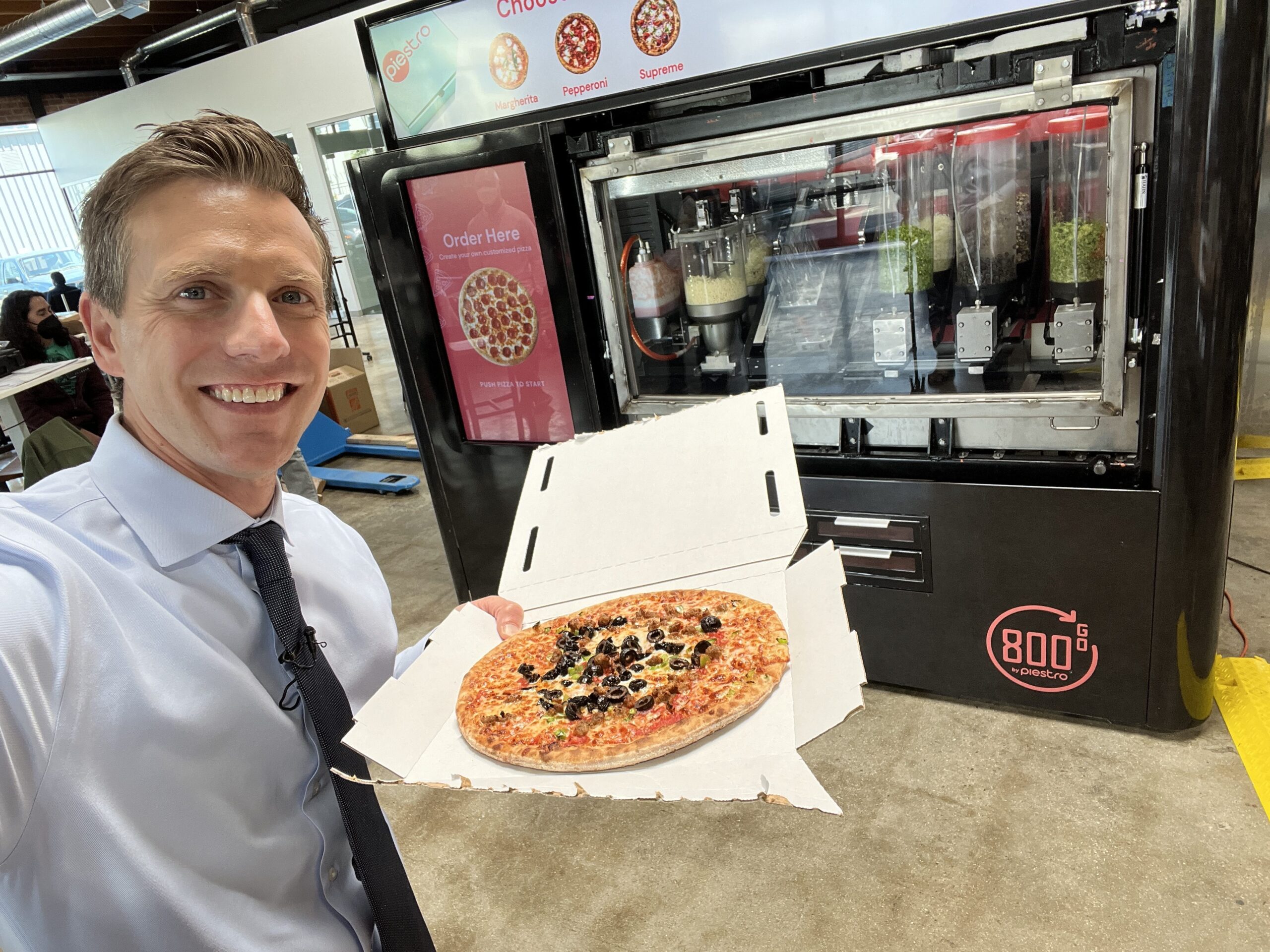 Illustrative example of pizza making vending machine
