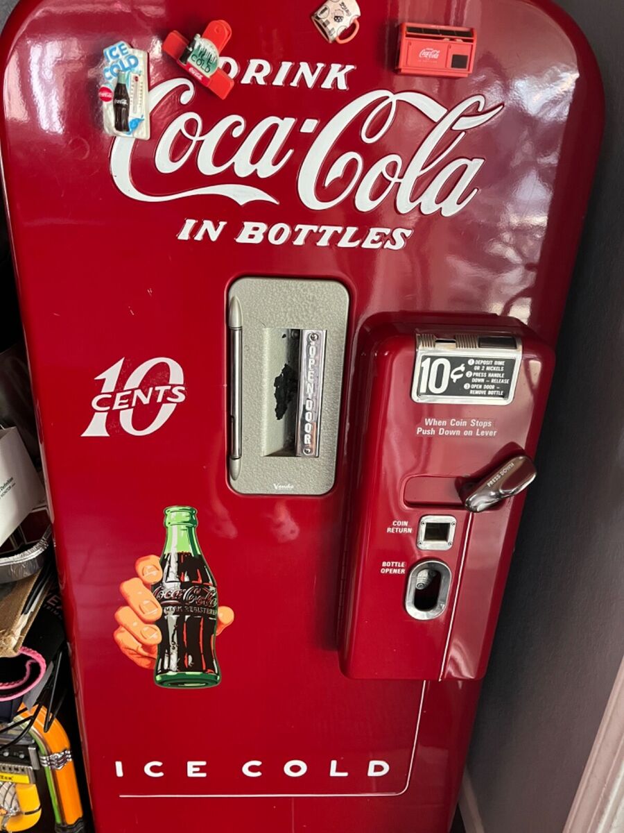 Illustrative example of vintage coca cola vending machine