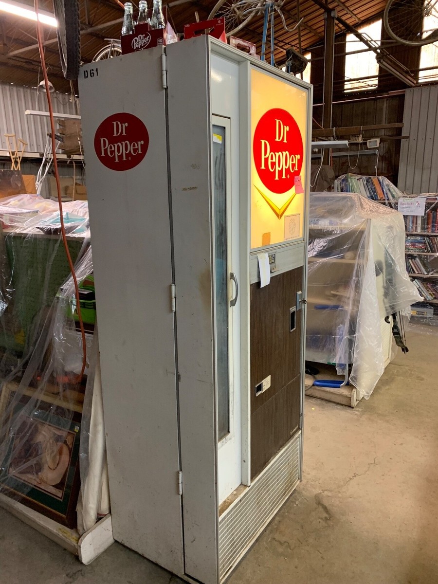 Illustrative example of vintage dr pepper vending machine