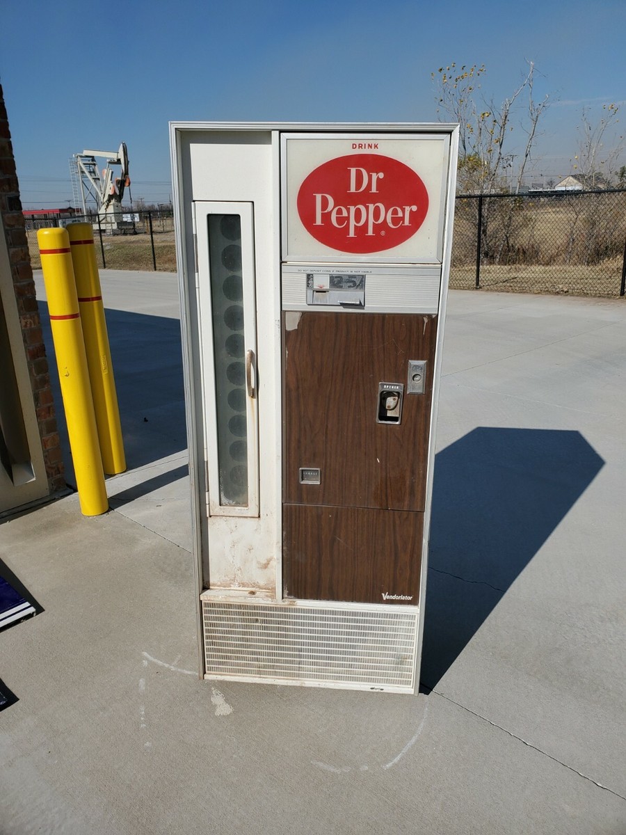 Illustrative example of vintage dr pepper vending machine