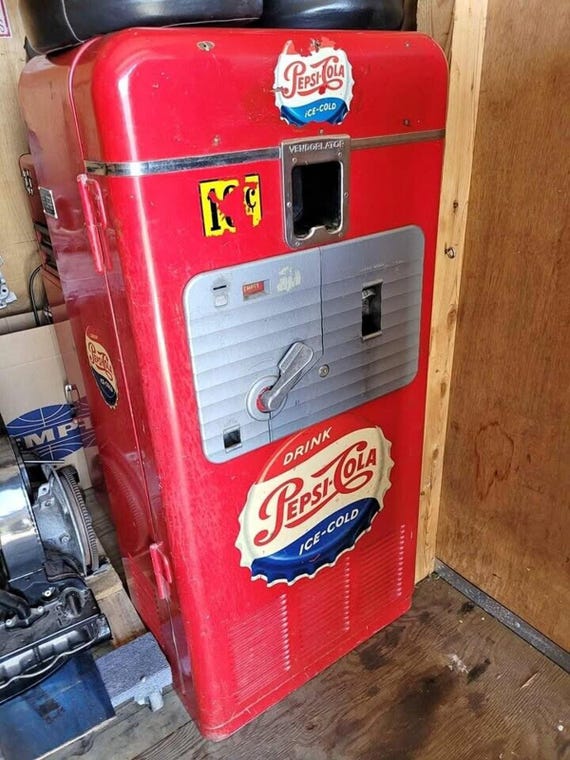 Illustrative example of vintage pepsi cola vending machine